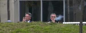 The Australian Treasurer Joe Hockey, right, and the Australian Finance Minister Mathias Cormann share a cigar two days before they deliver a budget tough on us chronically ill ex-smokers. Priceless!
